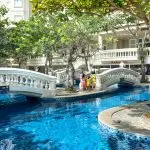 Family-friendly hotel with spacious room, kids playing area, and outdoor pool