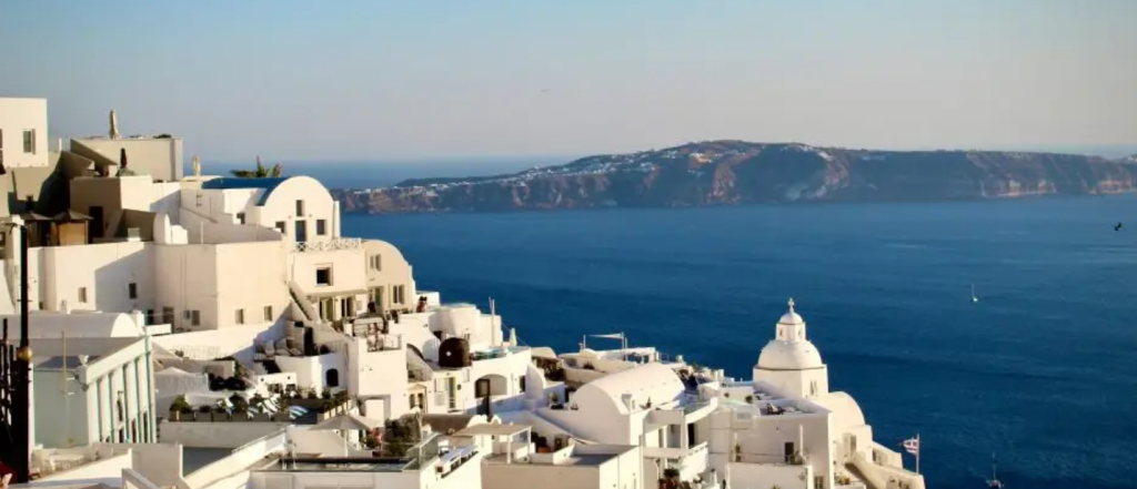 Canaves Oia Suites Santorini infinity pool overlooking the Aegean Sea